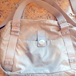 kipling purse! Light gray, adjustable, shoulder strap lots of pocket.